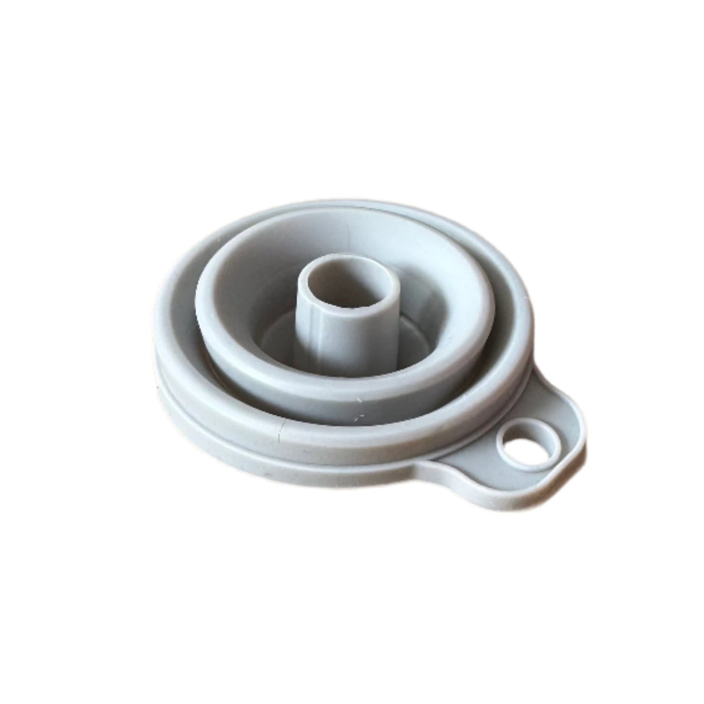Gray silicone strainer on a wooden surface