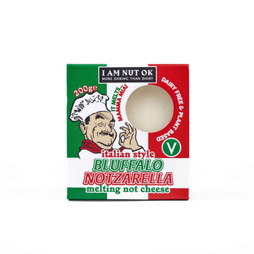 Packaging of 'I am Nut OK - Bluffalo Notzarella', a vegan mozzarella cheese alternative, with Italian flag colors and an illustration of a chef.