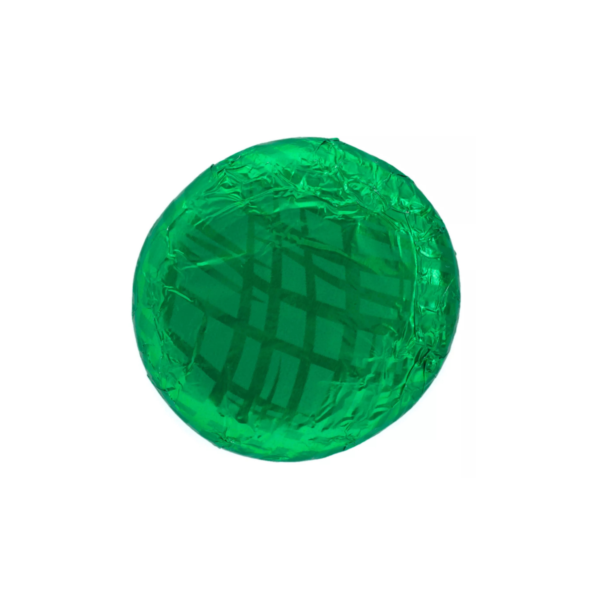 Green chocolate candy with foil wrapping on a white background