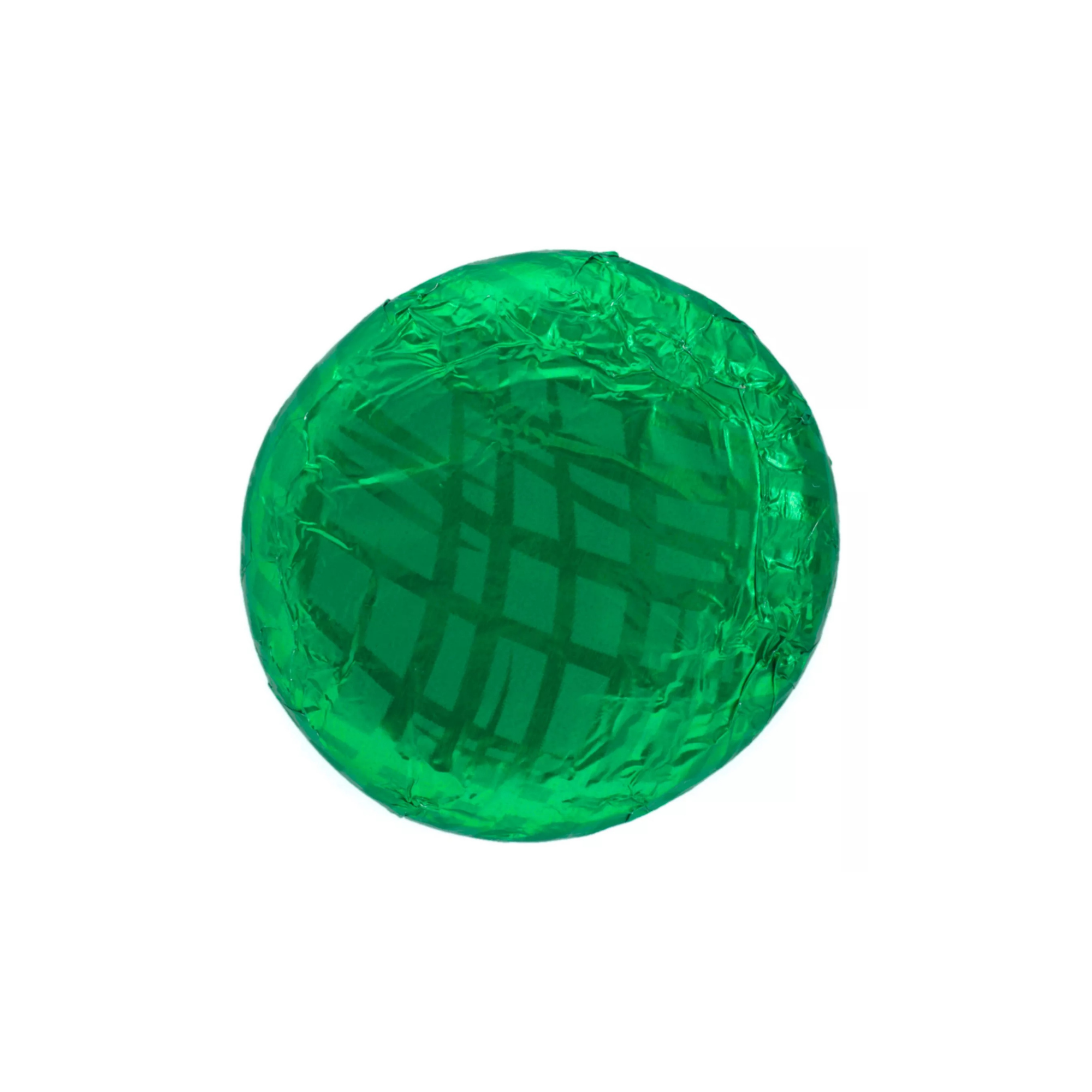 Green chocolate candy with foil wrapping on a white background