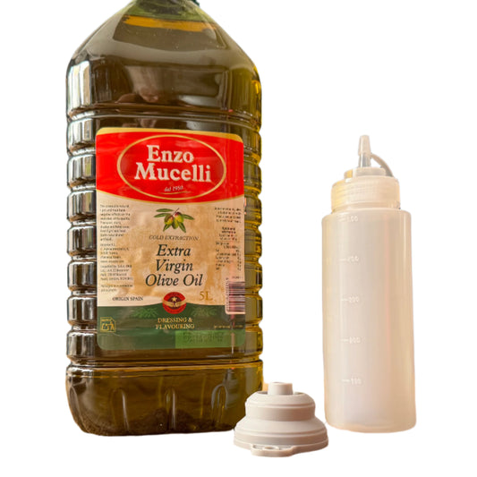 Enzo Mucelli olive oil bottle with a white dispenser on a wooden surface.
